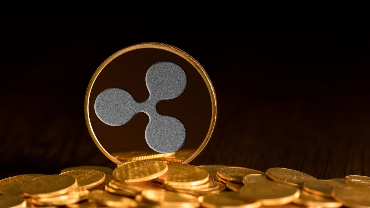 XRP coin with other coins laying down