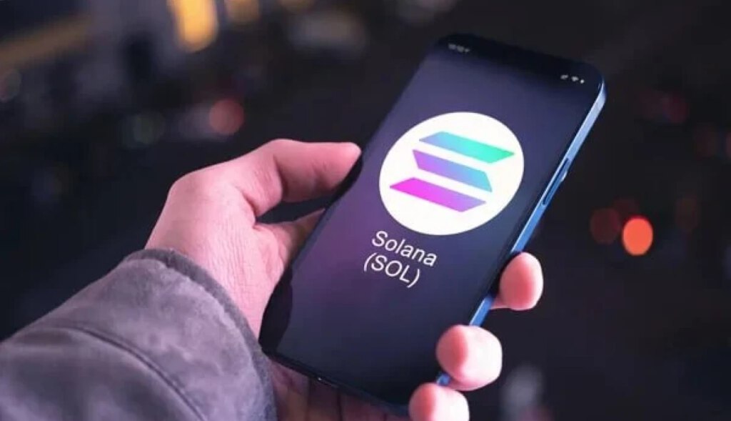 Solana Logo in a phone